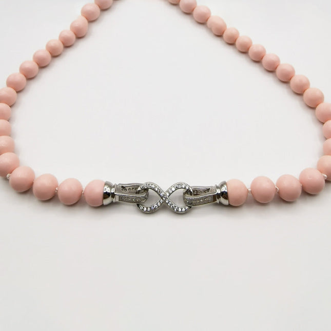 Collana in Corallo Rosa con Susta ad Infinito in Argento e Strass