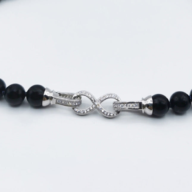 Particolare Susta ad Infinito in Argento e Strass