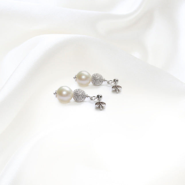 Orecchini in Oro con Sfere in Oro Diamantato