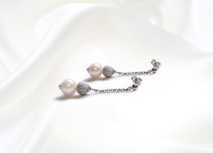 Orecchini Pendenti in Oro con Sfere in Oro Diamantato