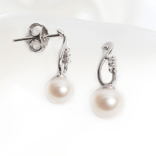 Orecchini in Oro e Diamanti con Perle