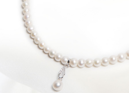 Pendente in perle, oro e diamanti 